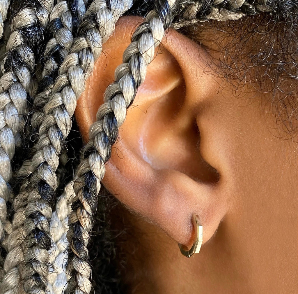 14k faceted gold huggies earrings.
