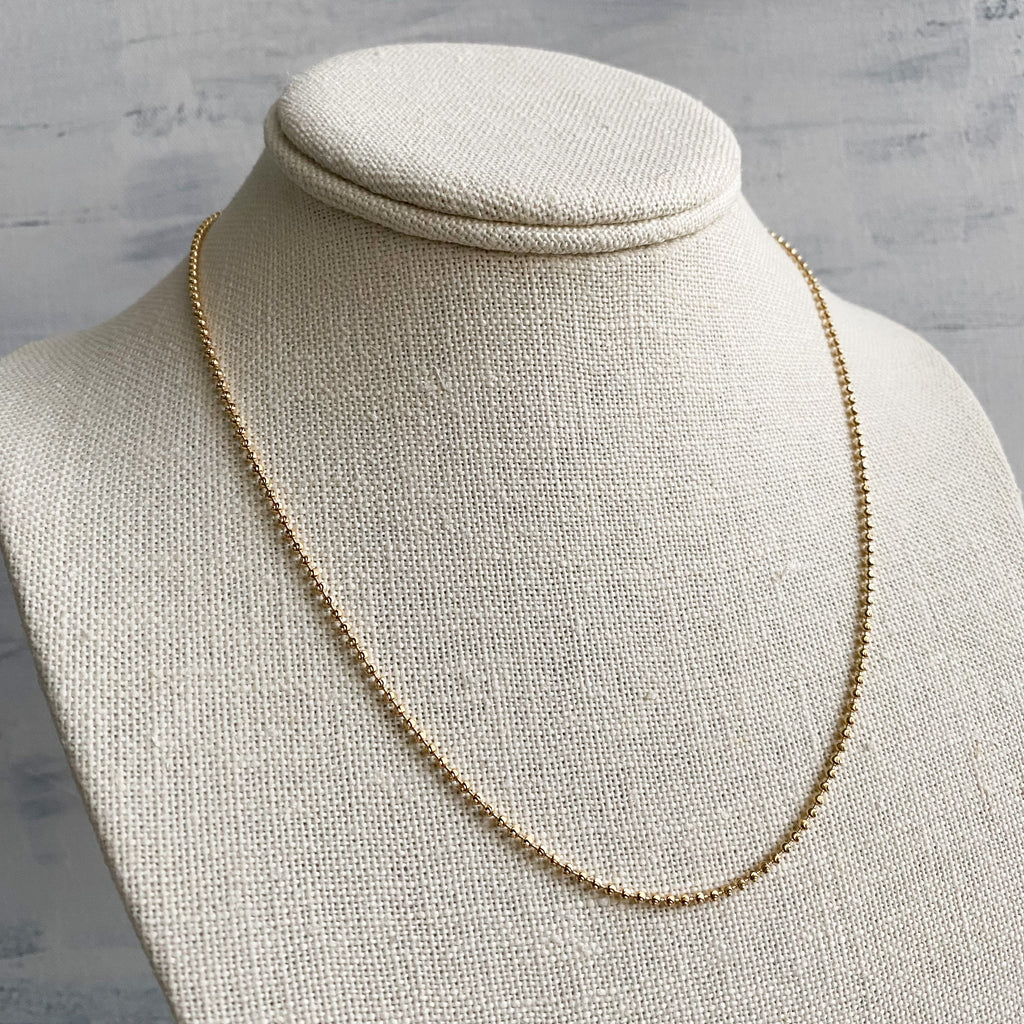 Moon cut bead chain.