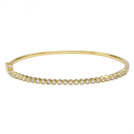 Diamond bezel bangle yellow gold.