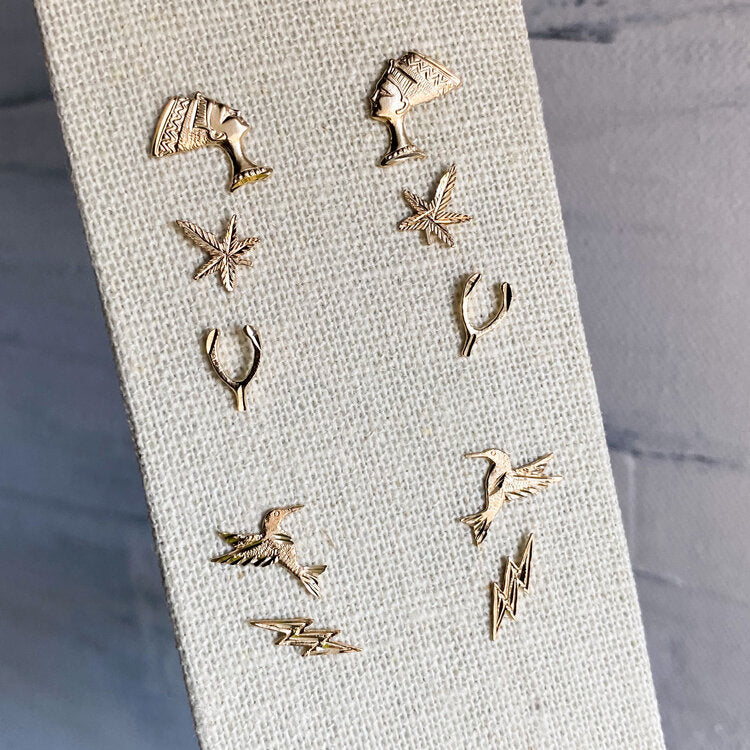 14k yellow gold hummingbird studs.